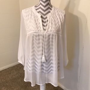 Maurice's sheer white blouse